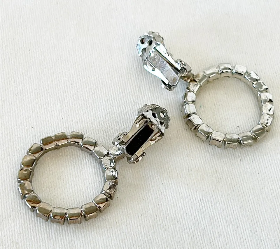 Classic vintage rhinestone round dangling hoop clip on earrings.